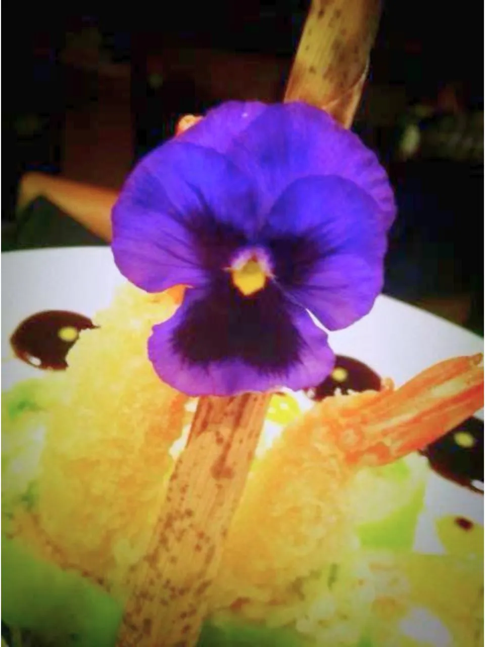 Crispy tempura shrimp with edible flower at Kumo Japanese Cuisine Restaurant in Depew